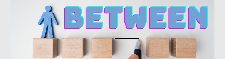 Small wooden figure being guided between blocks with the word ‘Between’ above.”