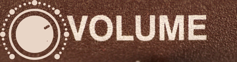 Close-up of the word ‘Volume’ beside a circular volume dial icon.