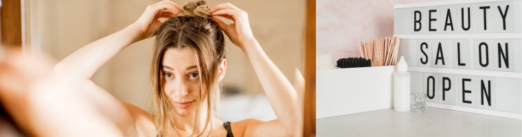 Woman styling her hair in a bun beside a beauty salon lightbox sign.